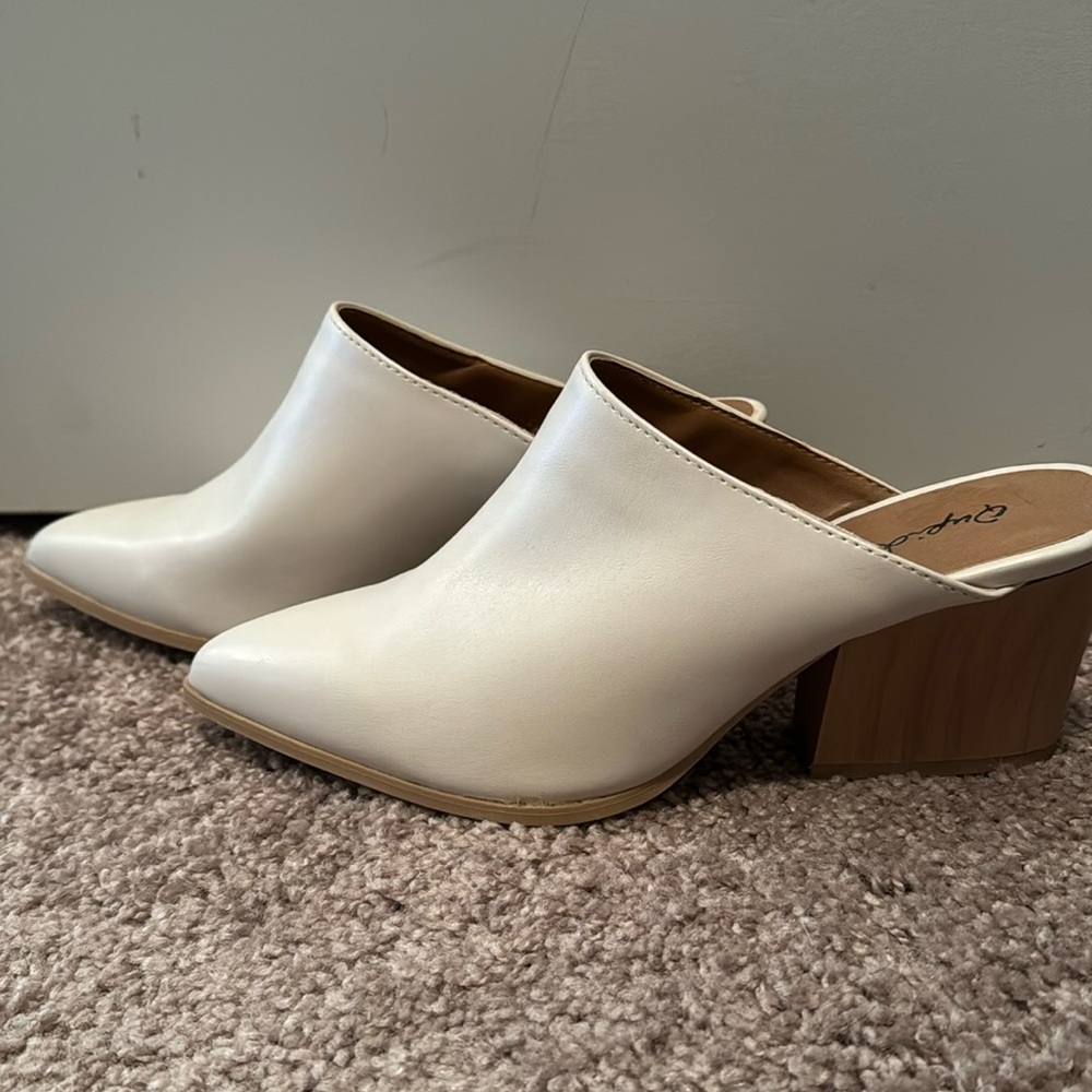 Rarely worn white heeled mules